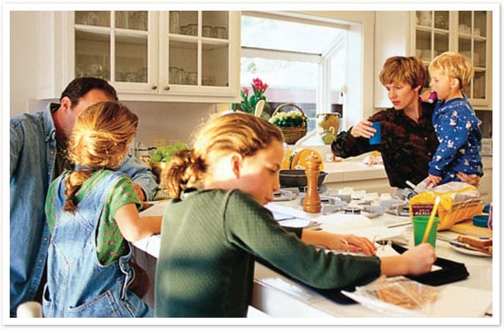 Family in Kitchen of new home