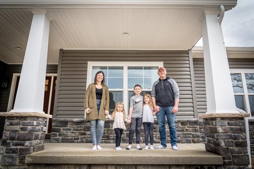 The Sedeis Family outside their home